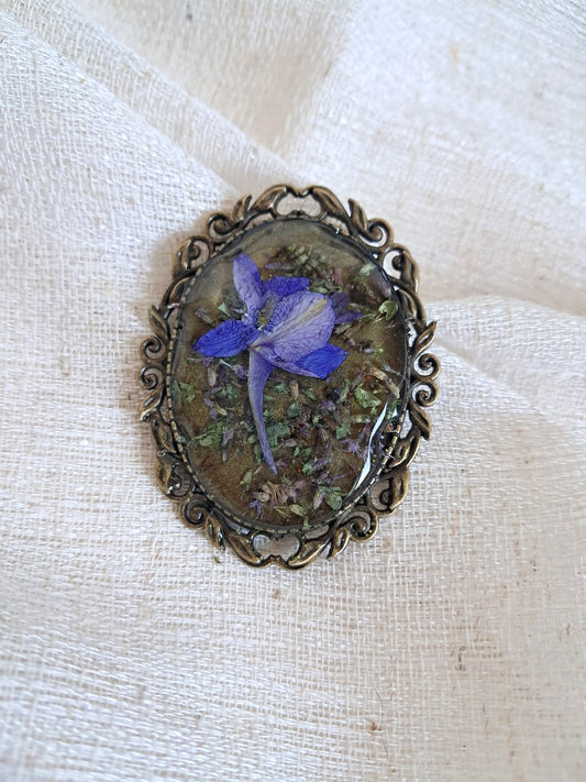 Broche delphinium